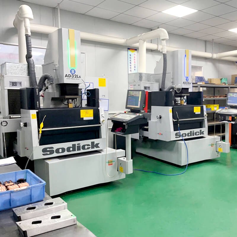 The workshop is equipped with Sodick AD32Ls precision machining equipment.