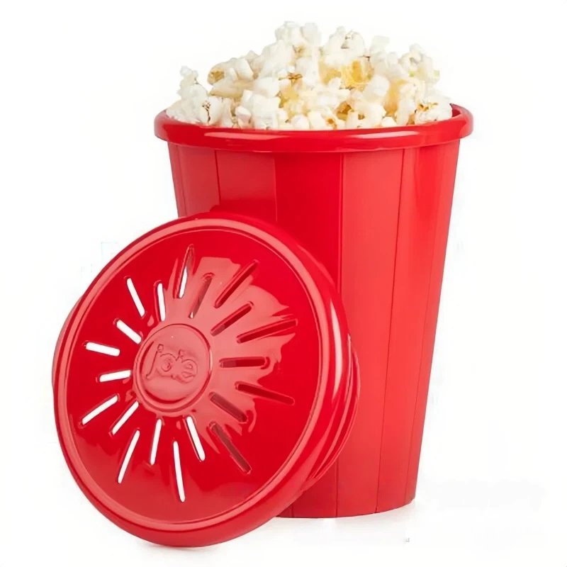 Red tall Silicone Popcorn Bucket with vented lid and popped popcorn