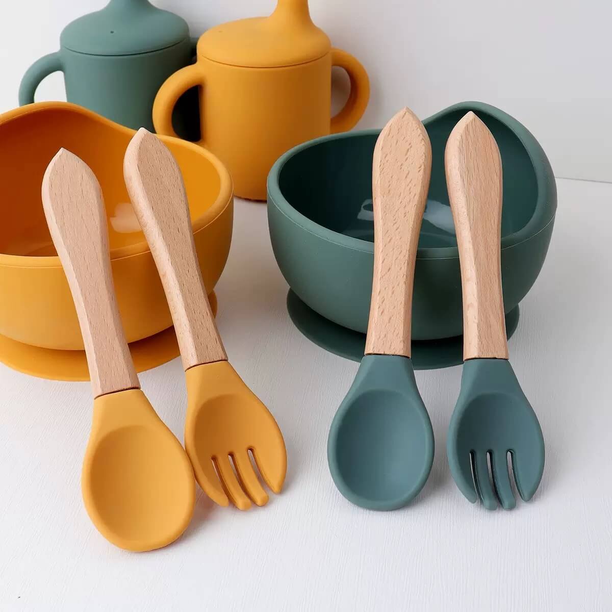 Silicone baby fork and spoon set with wooden handle and matching bowls