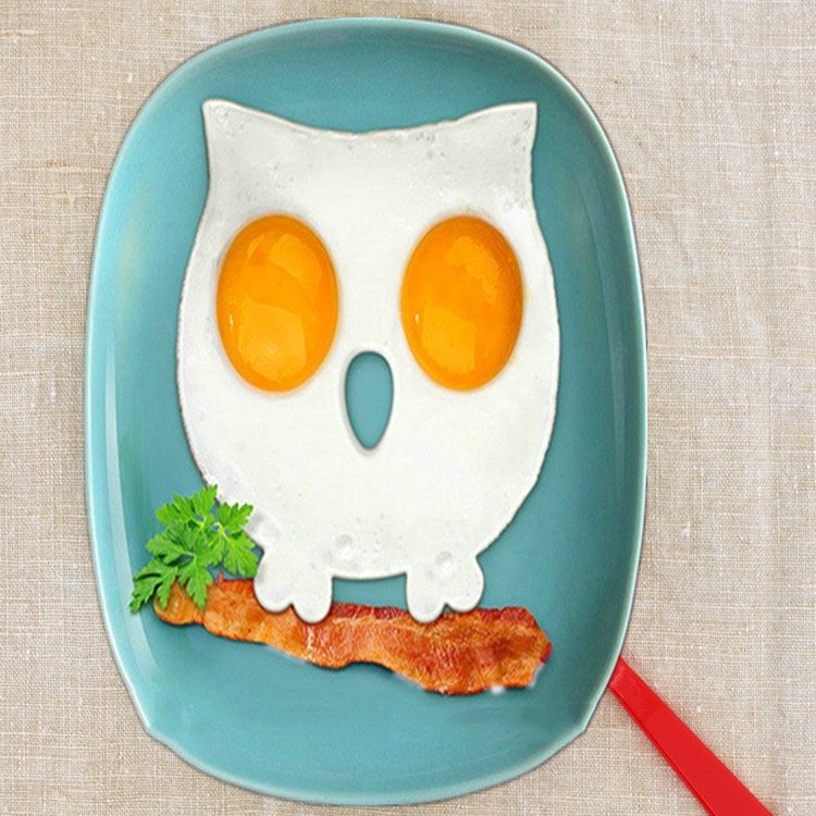 owl shaped fried egg on plate