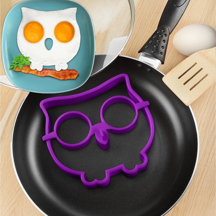 purple owl silicone egg ring in pan